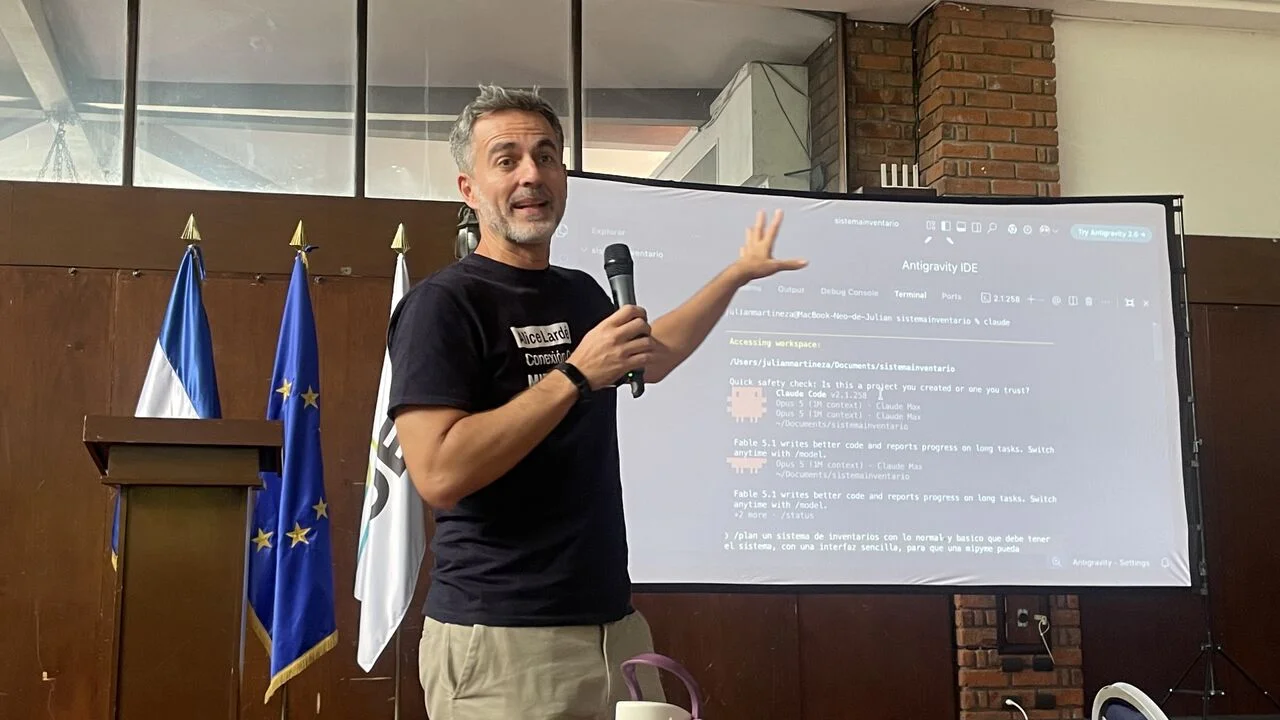 Julián Martínez shows on screen how to build an inventory system for a small business using an AI-assisted development environment