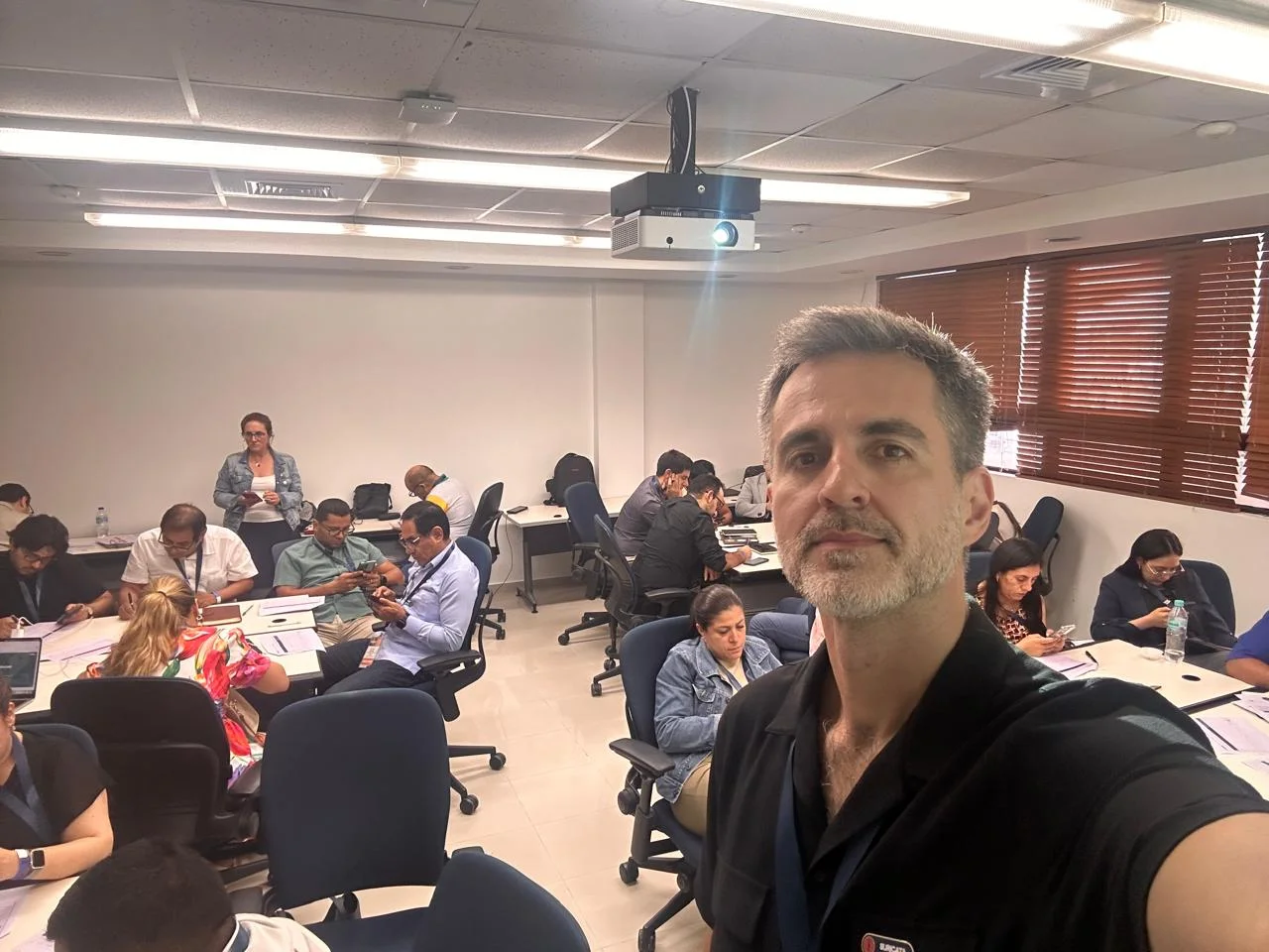 Workshop participants working in groups during the 15ST PRODEM in Santo Domingo